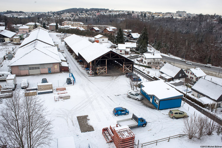 View of the company Dousse Constructions SA (Building at n°48, la route de Fribourg) from the building n°3, la route du Nord / © 